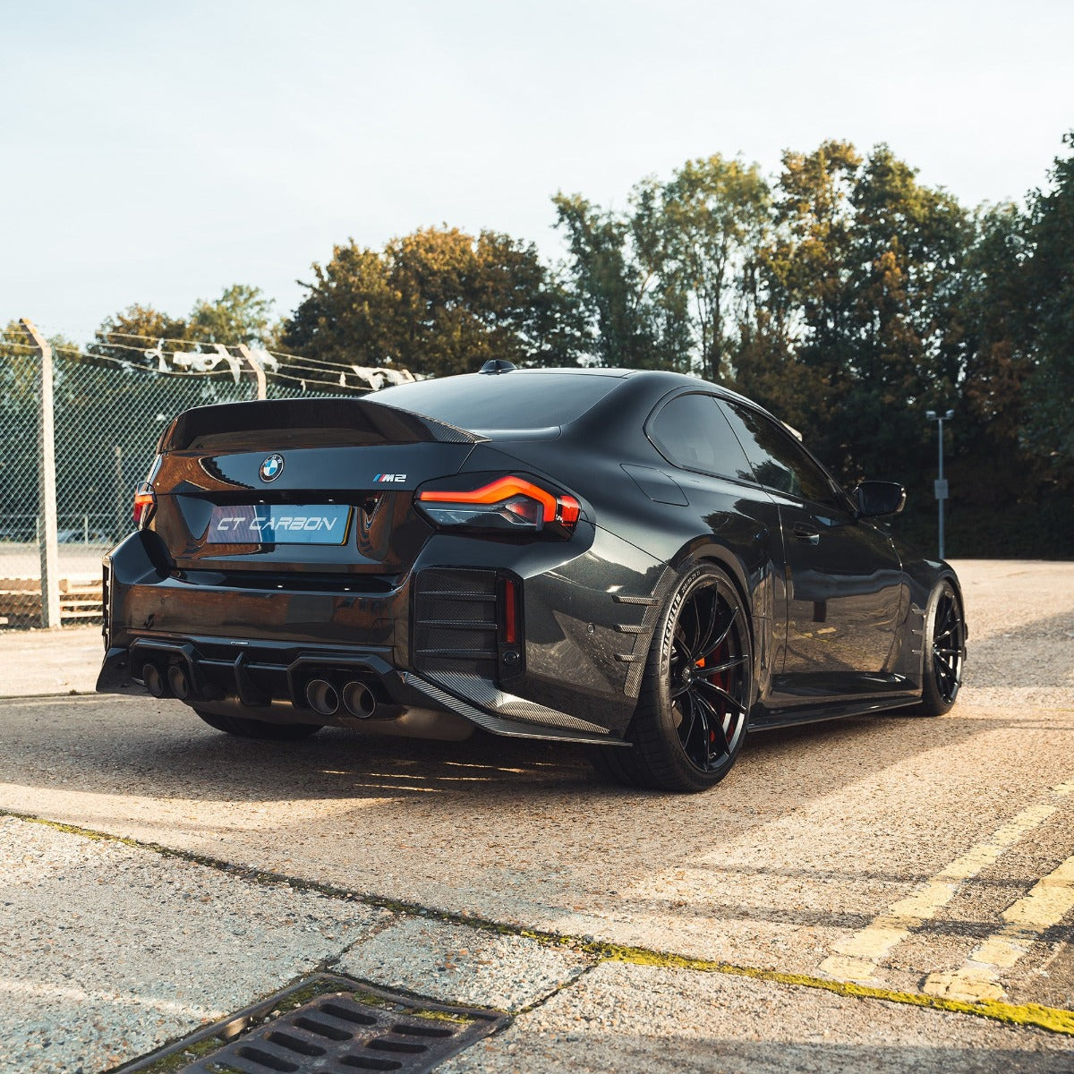 BMW G87 M2 CARBON FIBRE REAR BUMPER TRIM - CT DESIGN